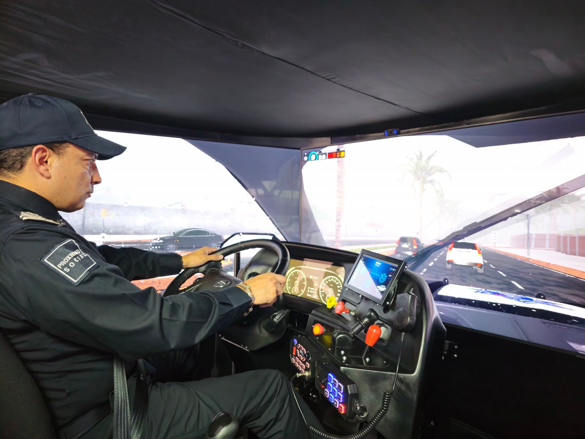 Guadalajara Police officer driving the APEX patrol simulator