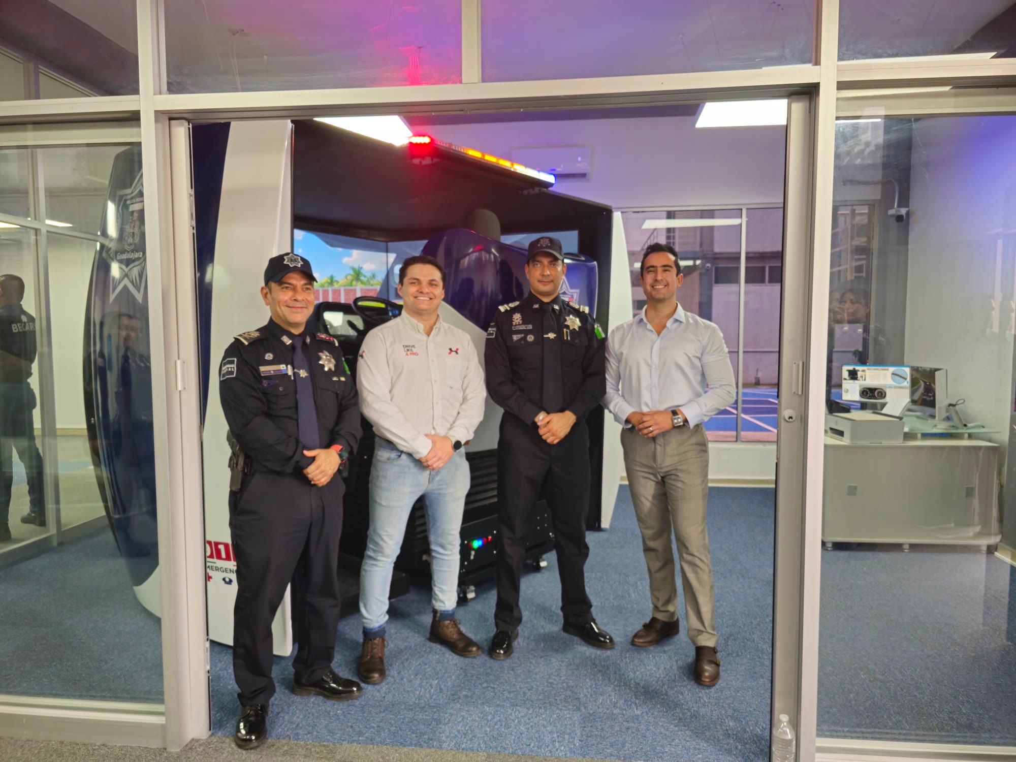 Guadalajara Police and APEX teams next to the simulators